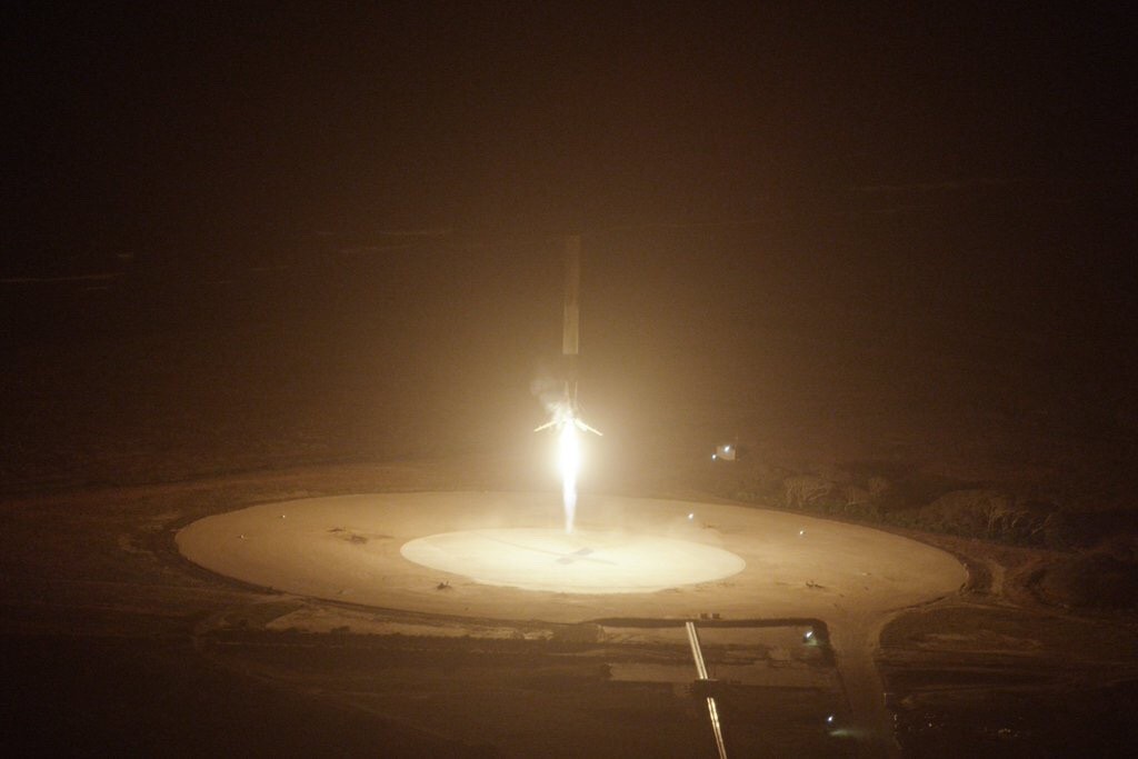 The 48-m Falcon 9 first stage lands back at Cape Canaveral after launching the second stage and 11 satellites into Earth orbit, 2015 December 21