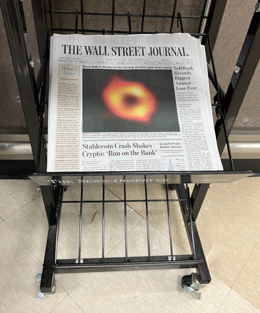 The Wall Street Journal in a newsstand at my local grocery story unveiling "above the fold" the first photo of the back hole at the center of the Milky Way